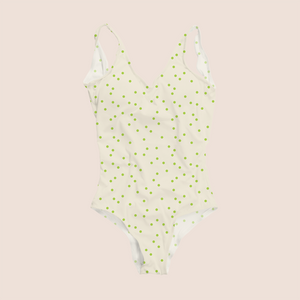 Messy dots in green on beige pattern design printed on recycled fabric lycra mockup