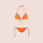 Load image into Gallery viewer, Animal skin digital in orange on orange pattern design printed on recycled fabric bikini mockup
