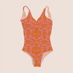 Load image into Gallery viewer, Animal skin digital in pink on orange design printed on recycled fabric swimsuit mockup
