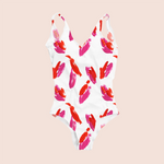 Load image into Gallery viewer, Paint brush strokes red and pink in white pattern design printed on recycled fabric swimsuit mockup
