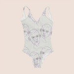 Load image into Gallery viewer, Man faces highlighted in grey recycled fabric swimwear
